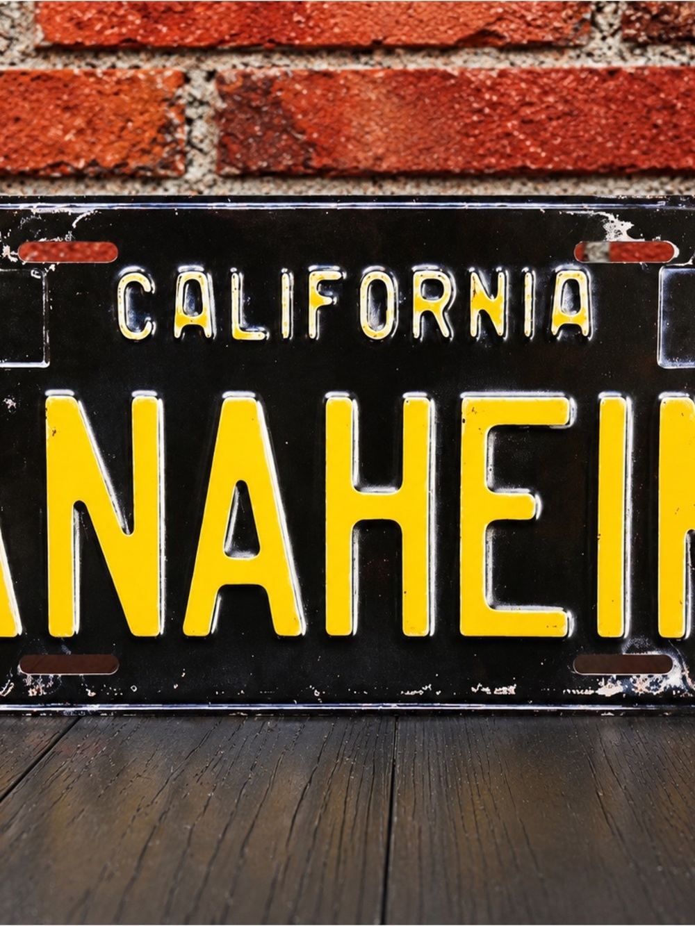 Vintage Black & Yellow Anaheim License Plate Wall Decor